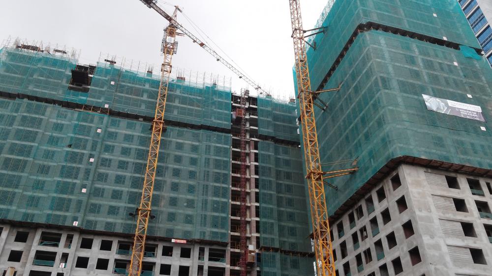 Tháp A thi công tới mặt sàn tầng 20, tháp B thi công tới tầng 21