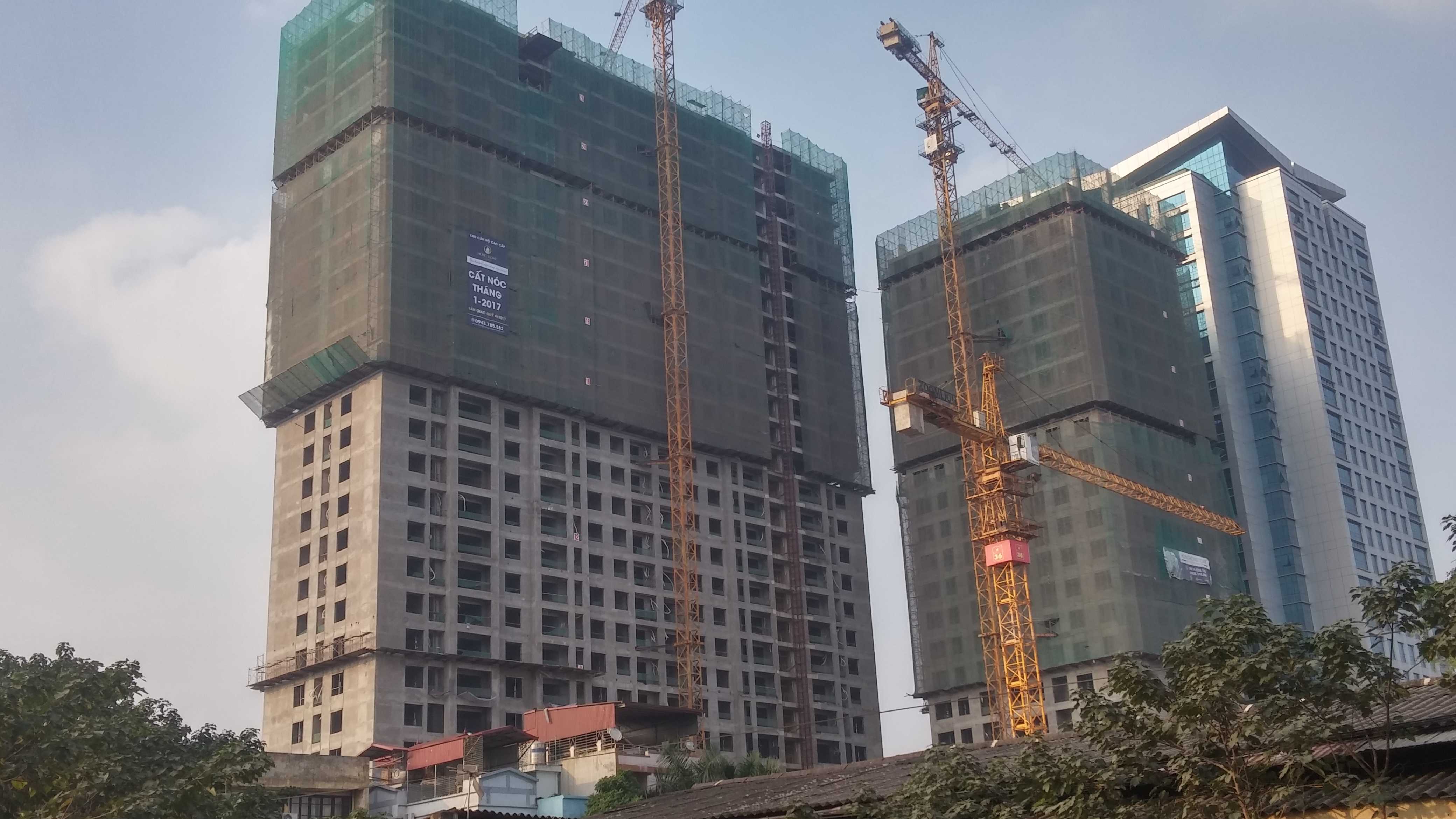 Tháp A đã hoàn thiện và chuẩn bị cất nóc, tháp B đang thi công tới mặt sàn tầng 23